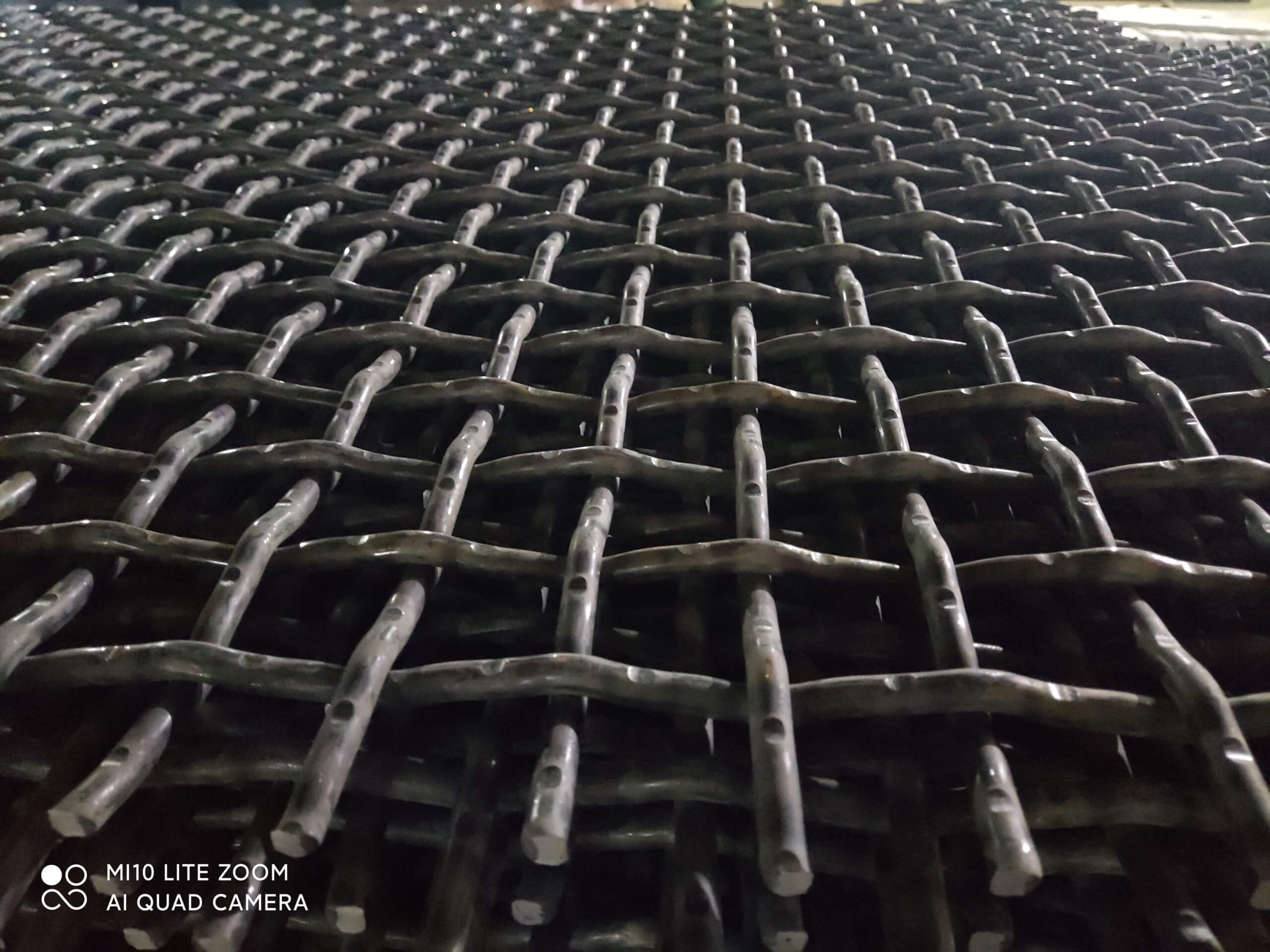 https://www.abxfence.com/wp-content/uploads/2021/12/crimped-wire-mesh-1-scaled.jpg